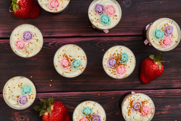 Cake with strawberry served in glass shots