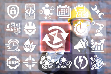 Industrial engineer presses hourglass circular arrow button on a virtual interface. Countdown Time Management Modern Smart Industrial concept.