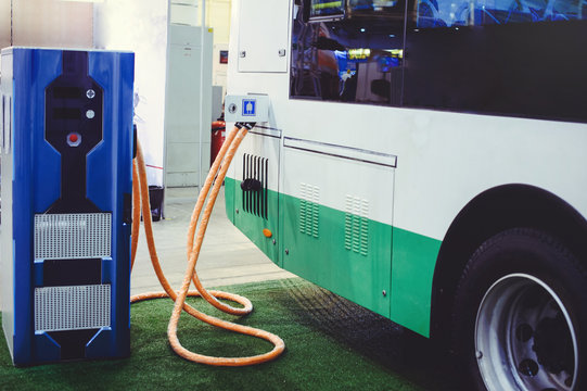 Details Of Electric Vehicle Charging City Bus Transport. Green And Renewable Energy Sources