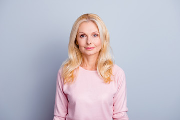 Close up portrait of charming stunning gorgeous beautiful lvely smart cute aging lady with long wavy blonde hair