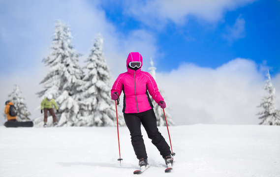 Woman skiing in mountains