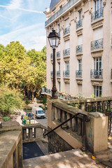 Fototapeta na wymiar View of the old street in the Montmartre quarter in Paris, France.