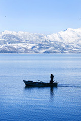 Fisherman boat on Lake Egirdir from Isparta City in Turkey. The lake is a second biggest freshwater lake in Mediterranean coast of Turkey