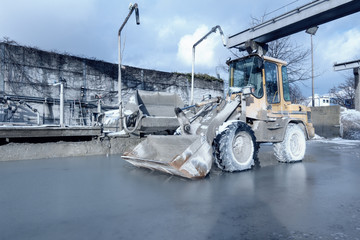 a bulldozer in freezing cold