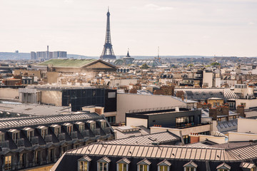 Fototapeta na wymiar Paris, panorama of the city is visible from the survey site on the roof of the famous Gallery store Lafayette.