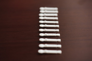 Lancets for an insulin pen on a wooden backgraund.