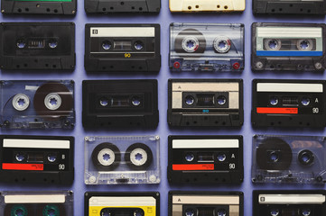 Vintage audio cassettes blue background
