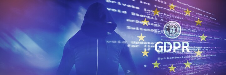 Composite image of male hacker wearing black hoodie while