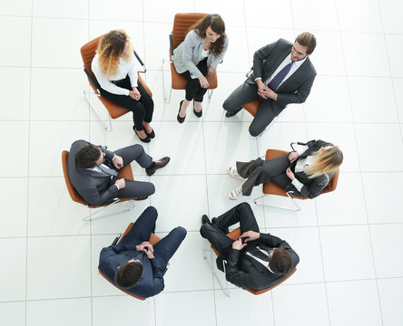 top view of business team discussing new ideas.