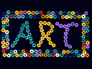art print created with beads on black background