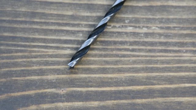 various drill bits for wood surface drilling.