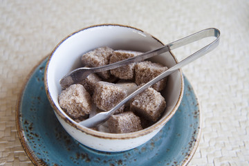 Pieces of white and brown sugar