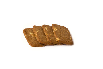 four shortbread cookies with almonds isolated on white background