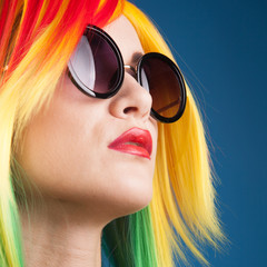 beautiful woman wearing color wig and sunglasses