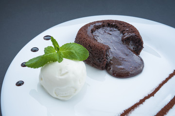 chocolate fondant and frosting on plates
