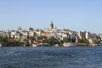 Fototapeta na wymiar Galata Tower view from Marmara Sea. İstanbul Beyoğlu Galata Tower. Galata Tower. Istanbul Panorama. 