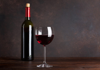 Fototapeta na wymiar Red wine bottle and glass
