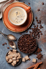 Obraz na płótnie Canvas Coffee cup, beans and sugar