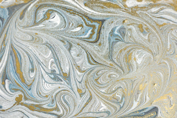 Marble abstract acrylic background. Nature marbling artwork texture. Golden glitter.