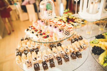 Different kinds of baked sweets on a buffet
