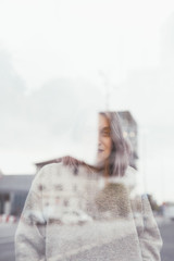 Double exposure portrait of young beautiful caucasian purple grey hair woman outdoor looking camera smiling - serene, carefree, positive emotions concept