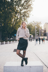 Young beautiful caucasian purple grey hair woman outdoor in the city having fun looking camera -...