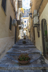 Street of the old town of Cefalu in Sicily, Italy