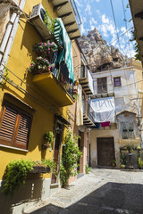 Street of the old town of Cefalu in Sicily, Italy