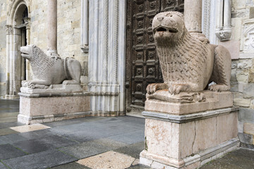 Lion statues in front of Parma Cathedral, Italy