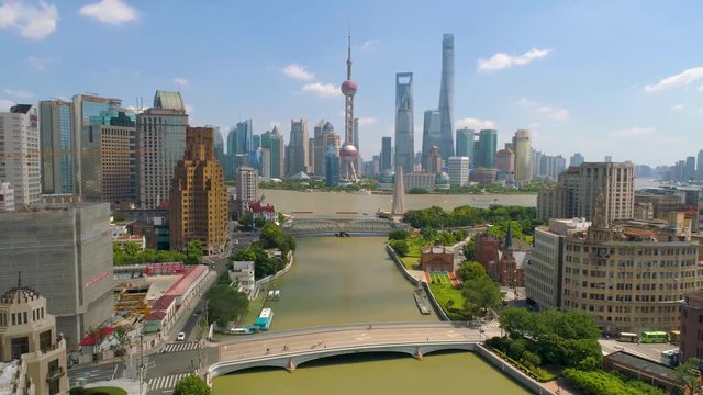SHANGHAI, CHINA - MAY 5, 2017: Aerial view video, business skycreapers skyline Huangpu river bridge