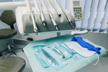 Instruments of the dentist, cabinet, furnishings. Clean and healthy teeth.