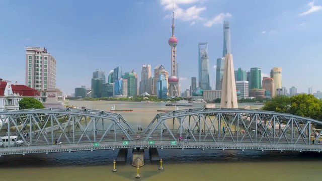 SHANGHAI, CHINA - MAY 5, 2017: Aerial view video, business skycreapers skyline Huangpu river bridge