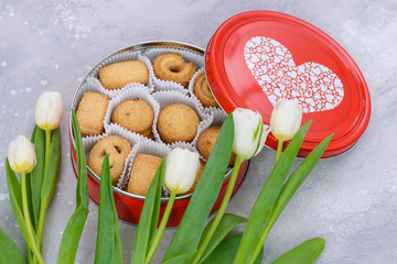 White tulips and cookie in box for gift