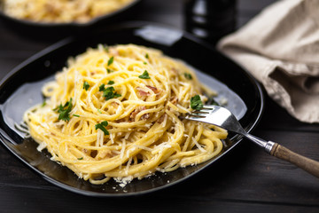 Spaghetti carbonara with egg and pancetta
