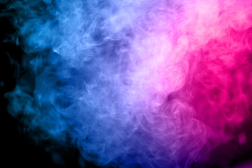 Abstract multicolored smoke on black background. Abstract bright colorful smoke on background. Color clouds.