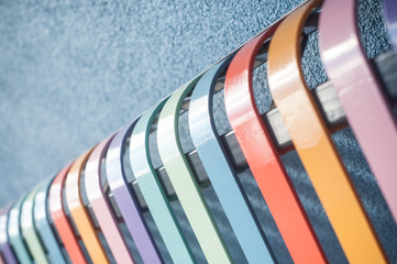 closeup of colorful metallic bench in the street