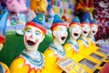clown heads at a fair 