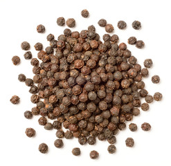 close up of dried black peppercorns isolated on white, top view