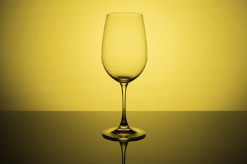 Glass on a yellow background.