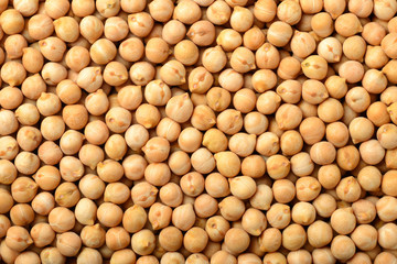 food background of raw chickpeas, top view