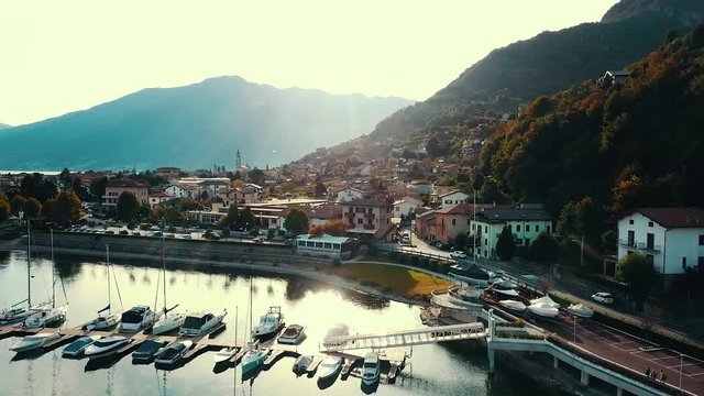 Aerial view of Como lake Italy. Italian village. Beautiful mountain landscape. Boating at Como lake. Lago di Como. Popular retreat in Italy. 