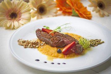 veal with orange sauce and strawberries