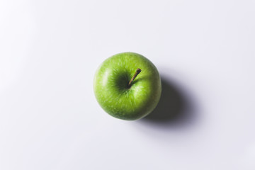 Green apple on white background