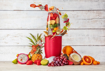 Smoothie maker mixer with fruit flying ingredients