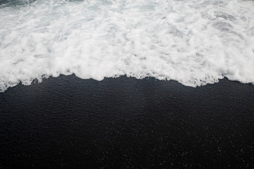 Black Sand Beach On The Island Of Maui