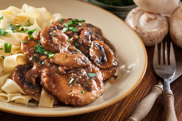 Delicious chicken marsala served with fettucine pasta