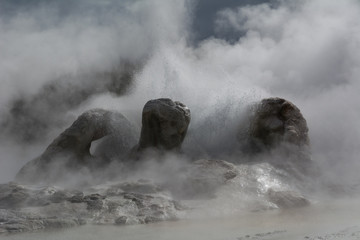 Grotto Geyser erupts, creating a mysterious atmosphere