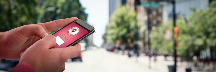 Composite image of close-up of man using mobile phone
