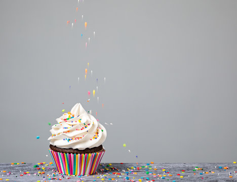 Decorating Cupcake with Sprinkles
