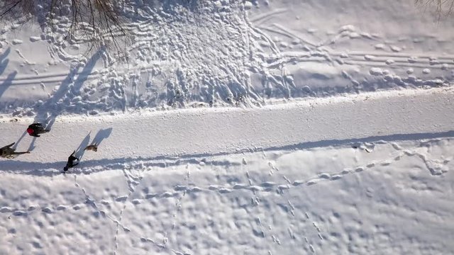 Winter walk along river drone